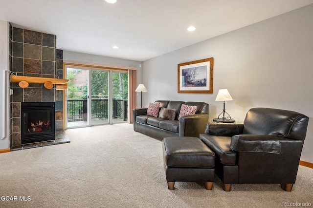 129 Logger Ln, Winter Park, CO 80482 - carpeted living area featuring a tile fireplace and recessed lighting