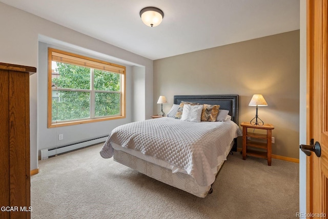 129 Logger Ln, Winter Park, CO 80482 - bedroom featuring carpet flooring and a baseboard heating unit