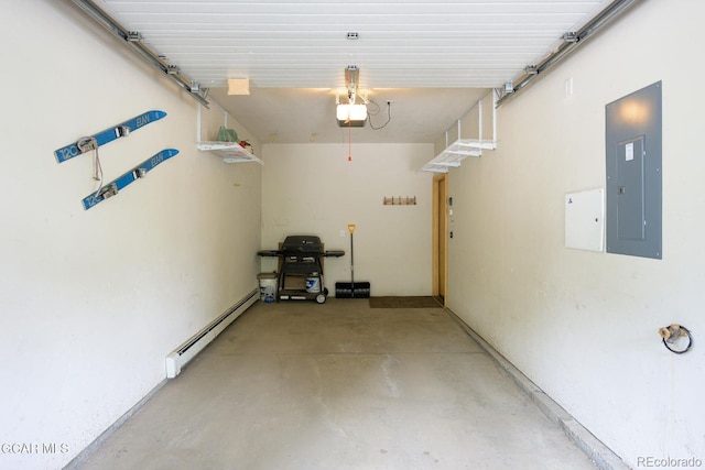 129 Logger Ln, Winter Park, CO 80482 - garage featuring a baseboard radiator, electric panel, and a garage door opener