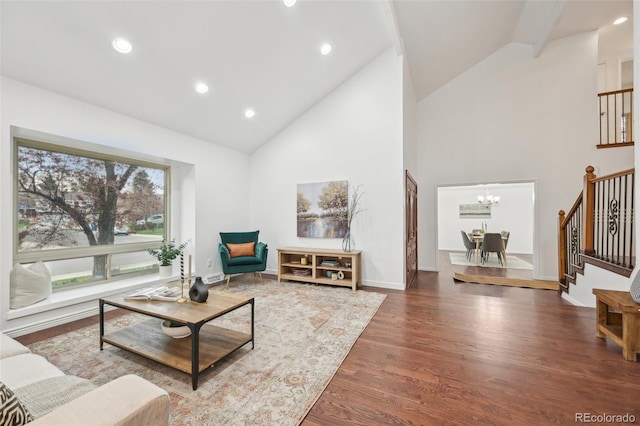 8424 E Otero Cir, Centennial, CO 80112 - living room featuring high vaulted ceiling, wood finished floors, a chandelier, stairs, and recessed lighting