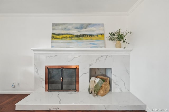 8424 E Otero Cir, Centennial, CO 80112 - detailed view of wood finished floors, ornamental molding, a fireplace, and baseboards