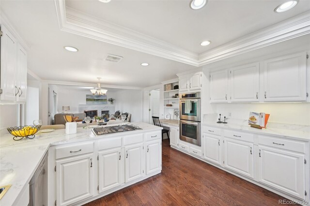8424 E Otero Cir, Centennial, CO 80112 - kitchen with appliances with stainless steel finishes, crown molding, white cabinetry, dark wood-style floors, and recessed lighting