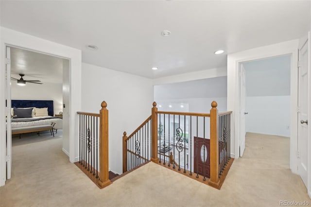 8424 E Otero Cir, Centennial, CO 80112 - corridor featuring carpet flooring, an upstairs landing, and recessed lighting