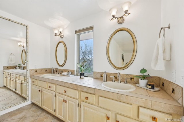 8424 E Otero Cir, Centennial, CO 80112 - bathroom featuring double vanity and tile patterned floors