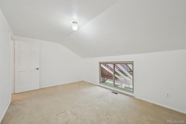 8424 E Otero Cir, Centennial, CO 80112 - additional living space featuring carpet, vaulted ceiling, and baseboards