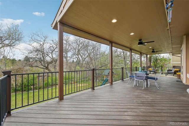 8424 E Otero Cir, Centennial, CO 80112 - wooden deck featuring outdoor dining space and a ceiling fan