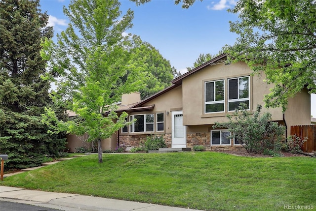 18445 W 59th Dr, Golden, CO 80403 - tri-level home with stone siding and stucco siding