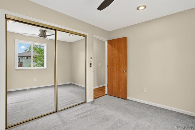 18445 W 59th Dr, Golden, CO 80403 - unfurnished bedroom with carpet flooring, a closet, ceiling fan, and recessed lighting