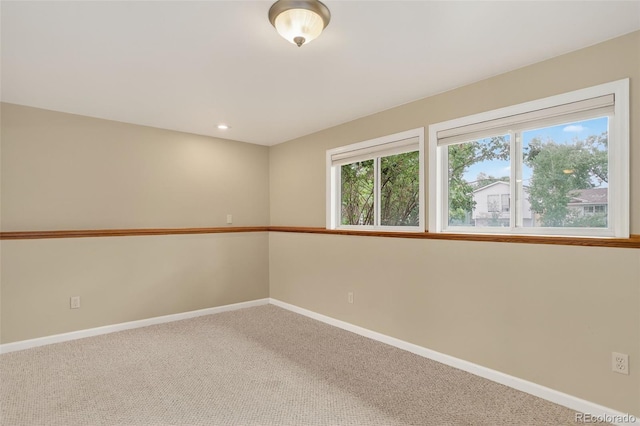 18445 W 59th Dr, Golden, CO 80403 - carpeted spare room with baseboards and recessed lighting