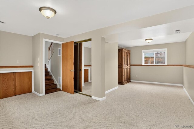 18445 W 59th Dr, Golden, CO 80403 - below grade area featuring light colored carpet and stairs