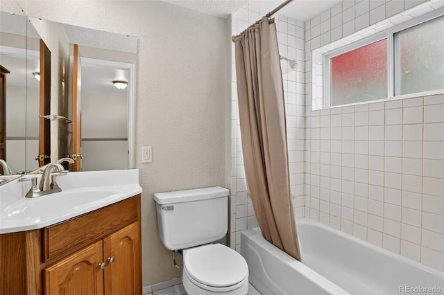 18445 W 59th Dr, Golden, CO 80403 - full bathroom featuring shower / bath combo, vanity, and a textured wall