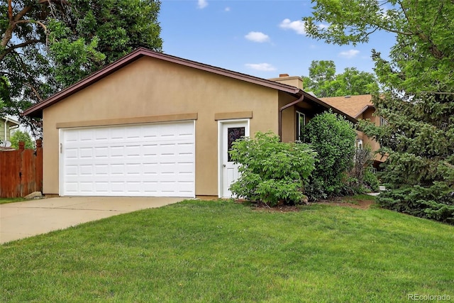 18445 W 59th Dr, Golden, CO 80403 - view of front of property with stucco siding, a chimney, and concrete driveway