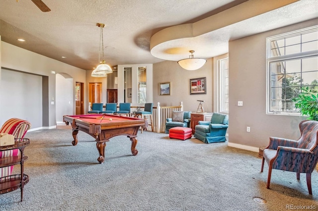 playroom featuring pool table, carpet flooring, and a textured ceiling