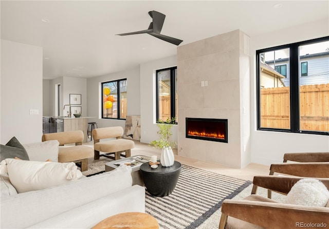 2391 King St, Denver, CO 80211 - living room with ceiling fan and a fireplace