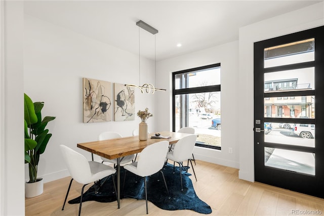 2391 King St, Denver, CO 80211 - dining area featuring light wood-style flooring and recessed lighting