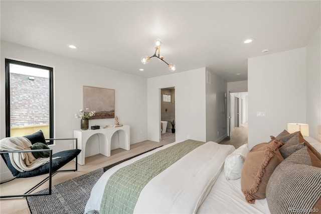 2391 King St, Denver, CO 80211 - bedroom featuring a chandelier, recessed lighting, and light wood-type flooring