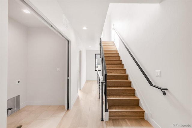 2391 King St, Denver, CO 80211 - staircase featuring recessed lighting and baseboards