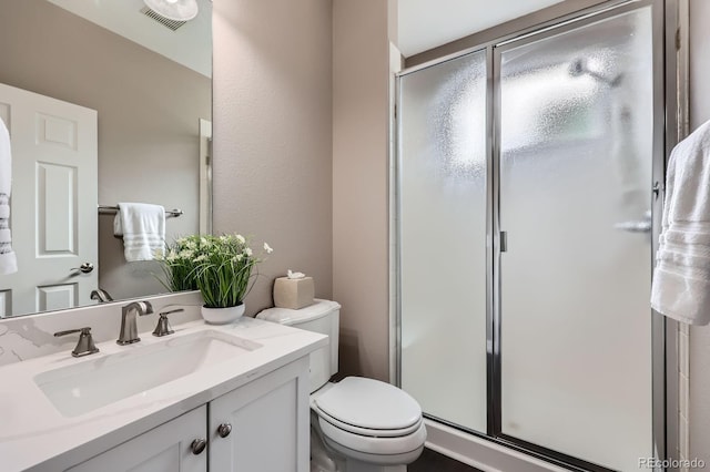8469 Winter Berry Dr, Castle Pines, CO 80108 - full bath featuring toilet, a shower stall, and vanity