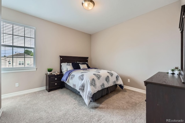 8469 Winter Berry Dr, Castle Pines, CO 80108 - carpeted bedroom with baseboards