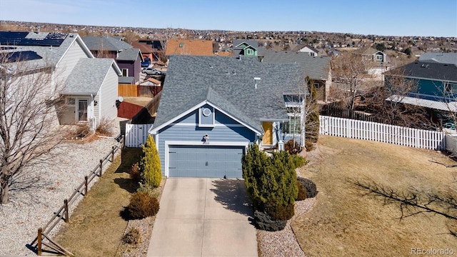 birds eye view of property with a residential view