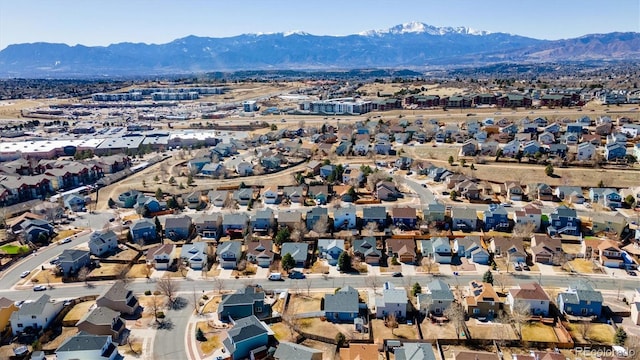 bird's eye view featuring a residential view and a mountain view