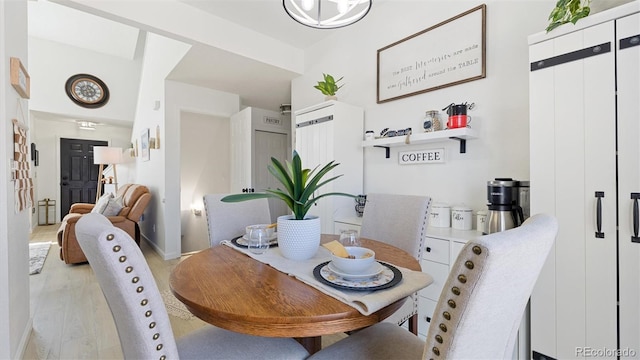 dining space with light wood finished floors