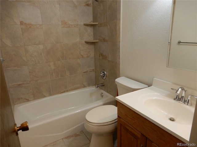 full bathroom featuring vanity, toilet, tiled shower / bath combo, and tile patterned flooring