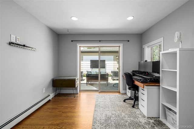 2845 Hudson St, Denver, CO 80207 - office featuring a baseboard radiator, wood finished floors, plenty of natural light, and recessed lighting