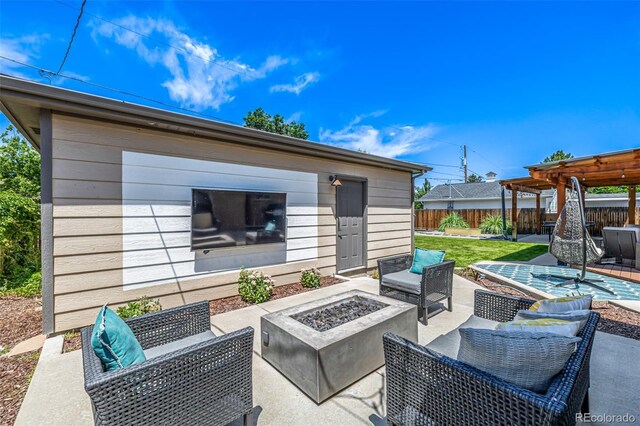 2845 Hudson St, Denver, CO 80207 - view of patio / terrace featuring an outdoor living space with a fire pit