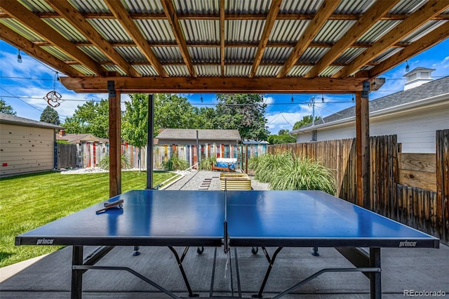 2845 Hudson St, Denver, CO 80207 - fenced backyard featuring outdoor dining space, an outbuilding, and a patio area