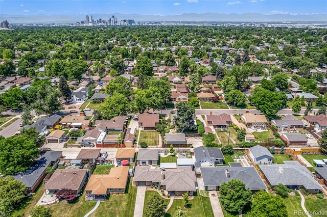 2845 Hudson St, Denver, CO 80207 - aerial overview of property's location featuring nearby suburban area and a mountainous background