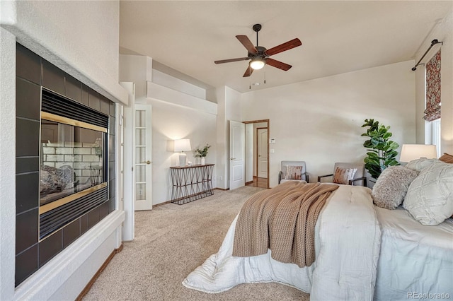 bedroom featuring carpet flooring, baseboards, and ceiling fan