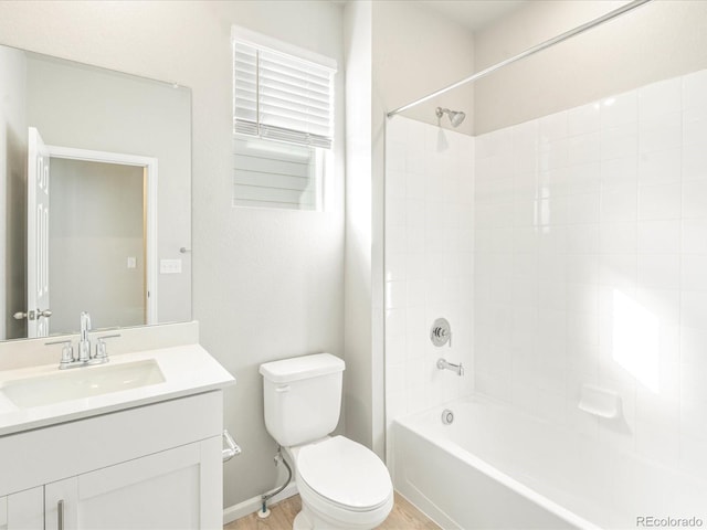 full bathroom with toilet, tub / shower combination, and vanity