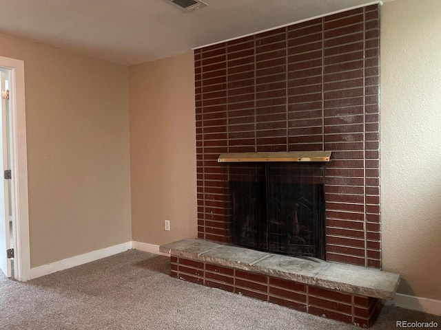 details with a fireplace and carpet floors