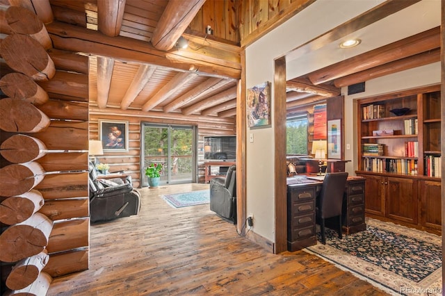 6241 Kilimanjaro Dr, Evergreen, CO 80439 - home office featuring wood ceiling, hardwood / wood-style floors, beamed ceiling, rustic walls, and recessed lighting
