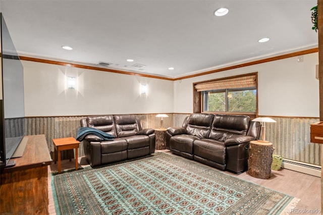 6241 Kilimanjaro Dr, Evergreen, CO 80439 - living area featuring wainscoting, a baseboard radiator, crown molding, wood finished floors, and recessed lighting