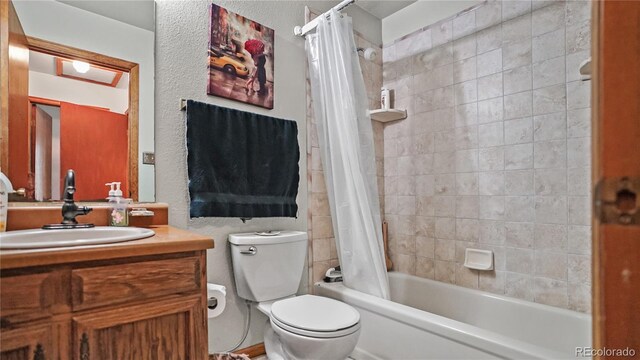 1269 Roland Dr, Bailey, CO 80421 - full bathroom with toilet, vanity, and shower / bath combo