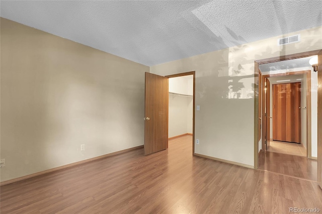 8225 Fairmount Dr Unit 102, Denver, CO 80247 - unfurnished room featuring wood finished floors and baseboards