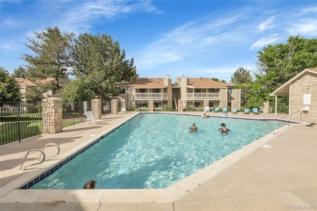 8225 Fairmount Dr Unit 102, Denver, CO 80247 - community pool with a patio area