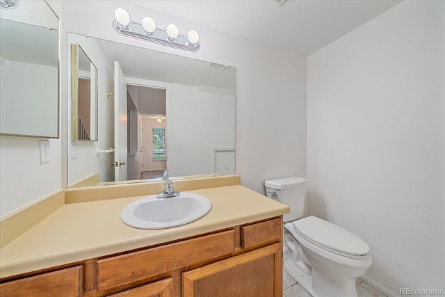 8438 Everett Way Unit B, Arvada, CO 80005 - half bath with vanity and tile patterned flooring