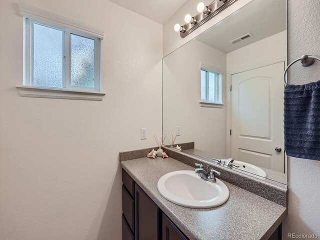 bathroom featuring vanity