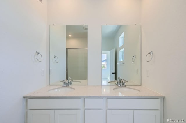 14578 W 90th Ln Unit D, Arvada, CO 80547 - full bathroom with double vanity and a shower