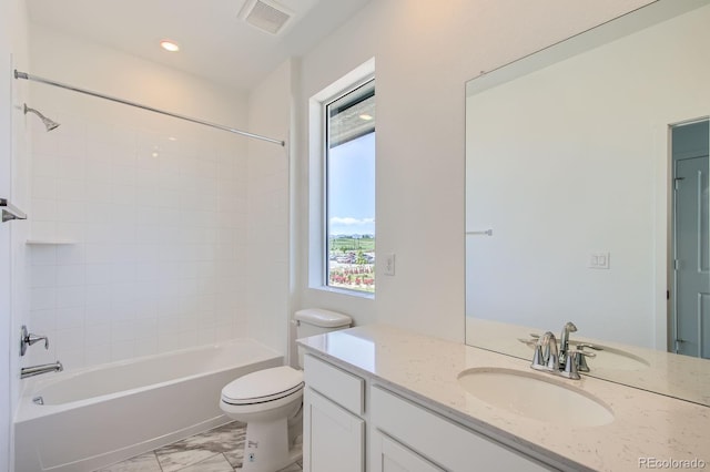 14578 W 90th Ln Unit D, Arvada, CO 80547 - full bathroom featuring vanity, shower / bath combination, marble finish floors, and recessed lighting