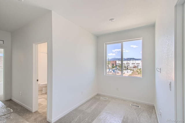 14578 W 90th Ln Unit D, Arvada, CO 80547 - spare room with carpet floors and baseboards