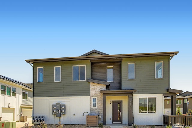 14578 W 90th Ln Unit D, Arvada, CO 80547 - view of front of home featuring stone siding