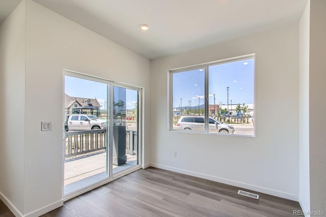 14578 W 90th Ln Unit D, Arvada, CO 80547 - empty room with wood finished floors and recessed lighting