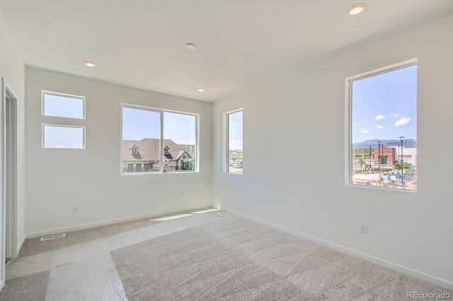 14578 W 90th Ln Unit D, Arvada, CO 80547 - carpeted empty room featuring baseboards and recessed lighting