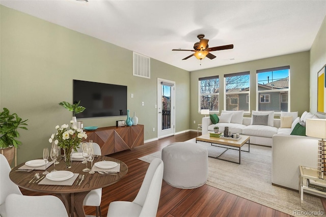 9633 E 5th Ave Unit 10208, Denver, CO 80230 - living room featuring wood finished floors, a ceiling fan, and baseboards