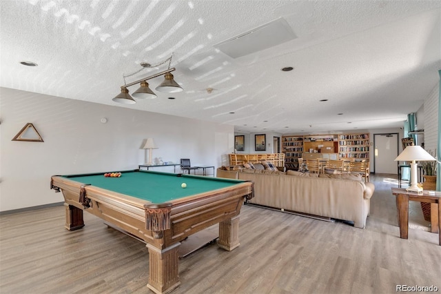 1888 S Jackson St Unit 603, Denver, CO 80210 - recreation room with light wood finished floors, a textured ceiling, and billiards