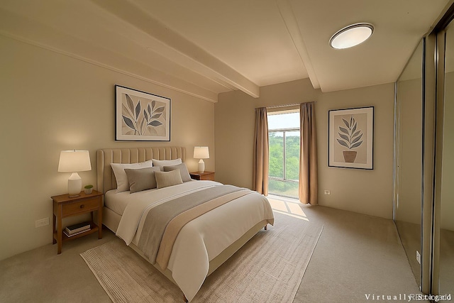 1888 S Jackson St Unit 603, Denver, CO 80210 - bedroom featuring light colored carpet, beamed ceiling, and access to exterior
